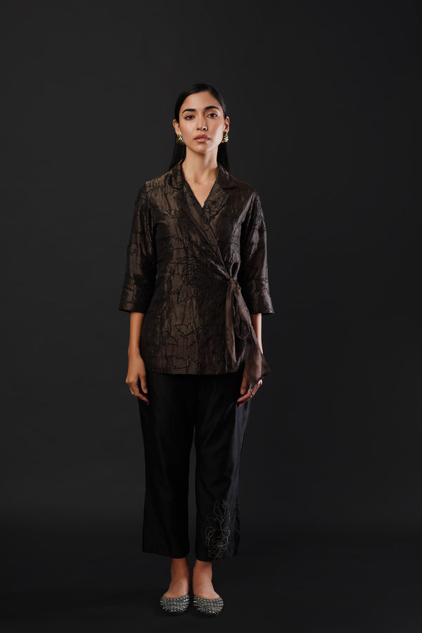 Embroided co-ordinated set featuring a coat paired with trousers.